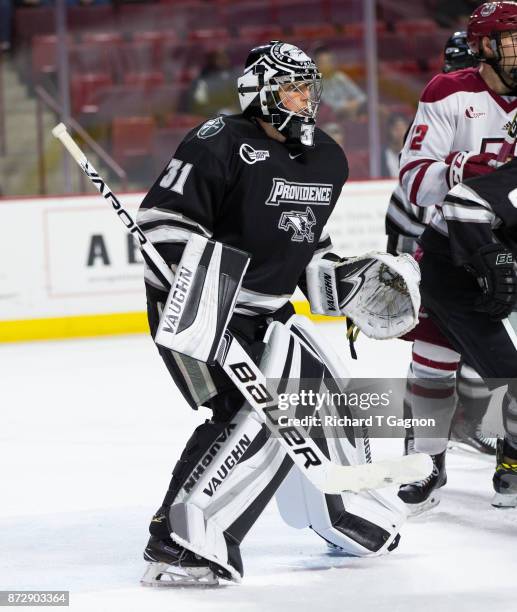 Hayden Hawkey of the Providence College Friars tends goal against the Massachusetts Minutemen during NCAA hockey at the Mullins Center on November 9,...