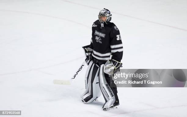 Hayden Hawkey of the Providence College Friars tends goal against the Massachusetts Minutemen during NCAA hockey at the Mullins Center on November 9,...