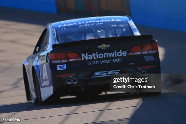 Dale Earnhardt Jr., driver of the Nationwide Chevrolet, practices for the Monster Energy NASCAR Cup Series Can-Am 500 at Phoenix International...