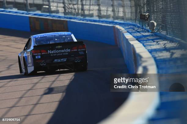 Dale Earnhardt Jr., driver of the Nationwide Chevrolet, practices for the Monster Energy NASCAR Cup Series Can-Am 500 at Phoenix International...