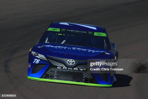 Martin Truex Jr., driver of the Auto-Owners Insurance Toyota, practices for the Monster Energy NASCAR Cup Series Can-Am 500 at Phoenix International...