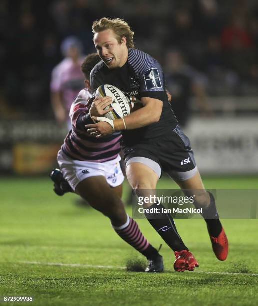 Joel Hodgson of Newcastle Falcons runs through to score this teams eighth try of the game during the Anglo-Welsh Cup match between Newcastle Falcons...