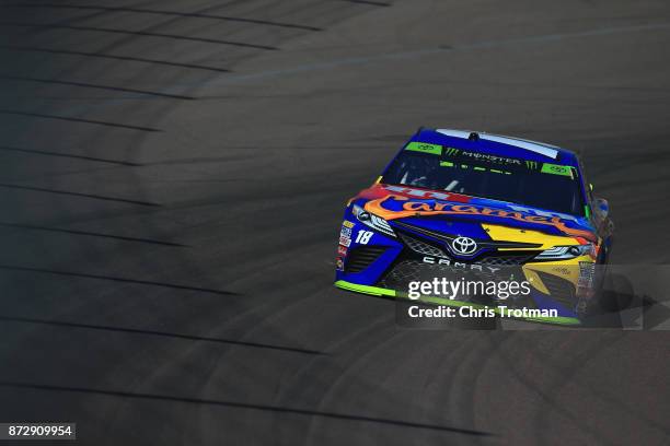 Kyle Busch, driver of the M&M's Caramel Toyota, practices for the Monster Energy NASCAR Cup Series Can-Am 500 at Phoenix International Raceway on...