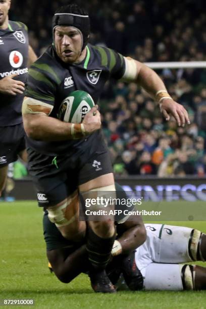 Ireland's flanker Sean O'Brien is tackled during the autumn international rugby union test match between Ireland and South Africa at the Aviva...