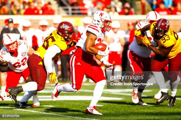 Nebraska Cornhuskers running back Devine Ozigbo rushes during the Big Ten Conference game between the Nebraska Cornhuskers and the Minnesota Golden...