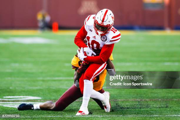 Nebraska Cornhuskers wide receiver JD Spielman is tackled in the 2nd quarter during the Big Ten Conference game between the Nebraska Cornhuskers and...
