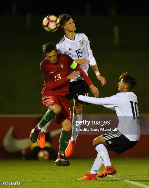 Tom Krauss of Germany is challenged by Francisco Saldanha Morais of Portugal during the International Match between Germany U17 and Portugal U17 at...