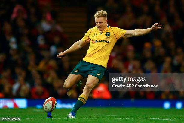 Australia's wing Reece Hodge takes a kick during the rugby union international Test match between Wales and Australia at the Principality Stadium in...