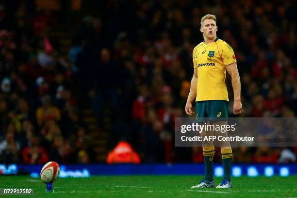 Australia's wing Reece Hodge takes a kick during the rugby union international Test match between Wales and Australia at the Principality Stadium in...