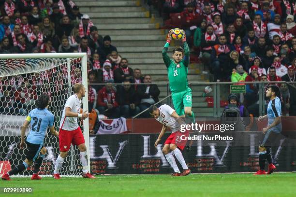 Lukasz Fabianski , Jaroslaw Jach in action during the international friendly match between Poland and Uruguay at National Stadium on November 10,...