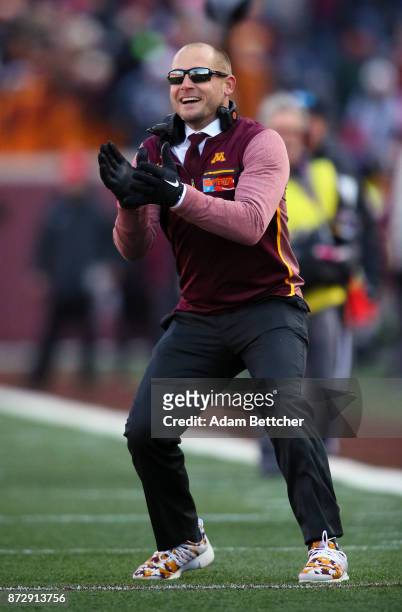Head coach P.J. Fleck of the Minnesota Golden Gophers celebrates a touchdown on the sidelines during the second quarter against the Nebraska...