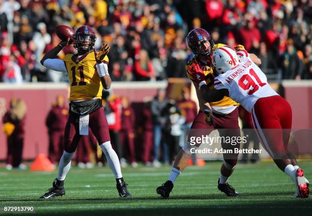 Demry Croft of the Minnesota Golden Gophers looks for an open receiver in the second quarter against the Nebraska Cornhuskers at TCF Bank Stadium on...