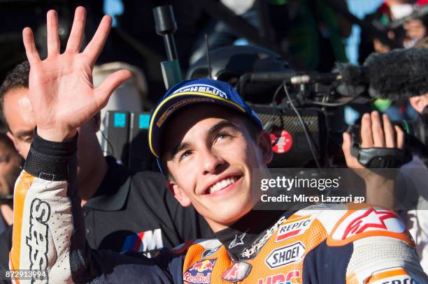 Marc Marquez of Spain and Repsol Honda Team celebrates the pole position in MotoGP at the end of the qualifying practice during the Comunitat...