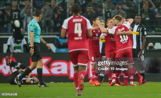 Levin Oeztunali of FSV Mainz 05 and Alexandru Maxim of FSV Mainz 05 celebrate their team¥s goal during the Bundesliga match between Borussia...