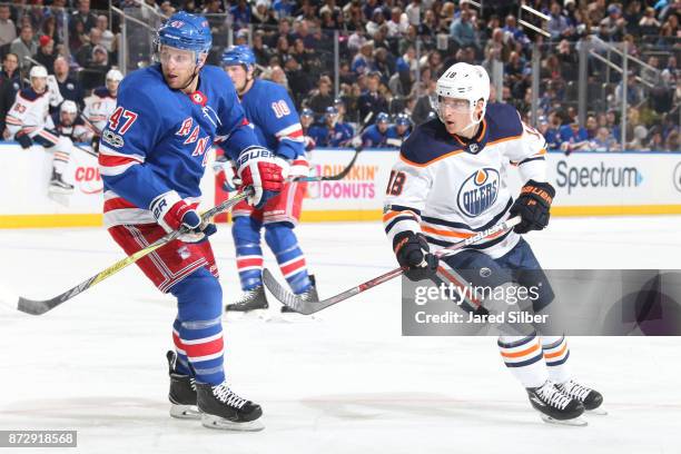 Ryan Strome of the Edmonton Oilers skates against Steven Kampfer of the New York Rangers at Madison Square Garden on November 11, 2017 in New York...