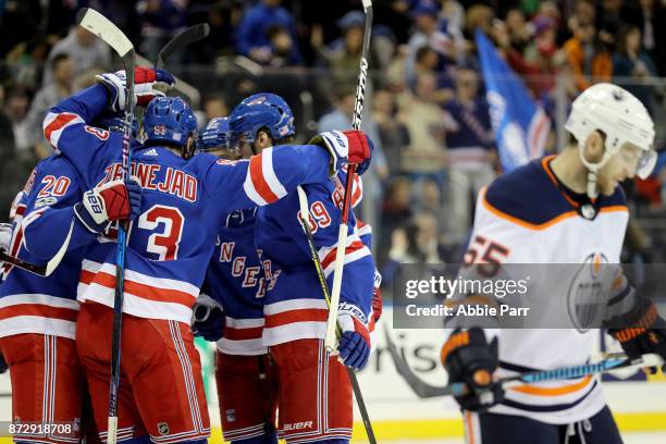 The New York Rangers celebrate a goal by Pavel Buchnevich in the second period against the Edmonton Oilers during their game at Madison Square Garden...