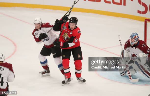 Mark Stone of the Ottawa Senators skates against Chris Bigras of the Colorado Avalanche at the Ericsson Globe on November 11, 2017 in Stockholm,...