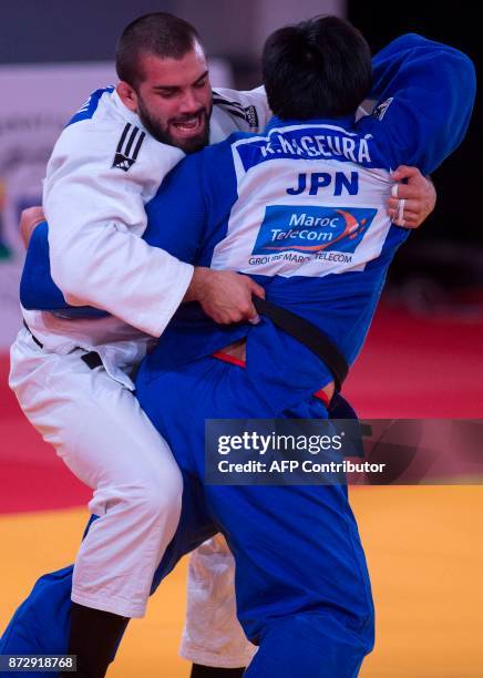 Belgium's Toma Nikiforov competes against Japan's Kokoro Kageura during the Judo World Championships Open in Marrakesh on November 11, 2017. / AFP...