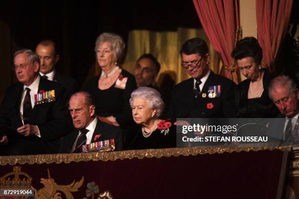 Britain's Prince Philip, Duke of Edinburgh, Britain's Queen Elizabeth II, Vice Admiral Timothy Laurence, Britain's Princess Anne, Princess Royal, and...