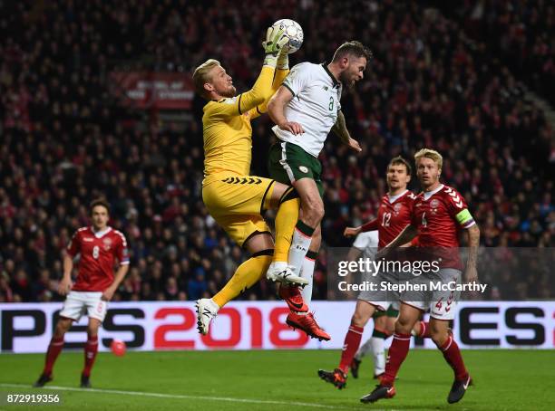 Copenhagen , Denmark - 11 November 2017; Kasper Schmeichel of Denmark in action against Daryl Murphy of Republic of Ireland during the FIFA 2018...