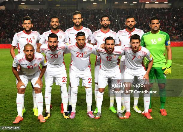 Players of the Tunisian national football team line up during the World Cup 2018 qualifying football match against Libya on November 11, 2017 at the...