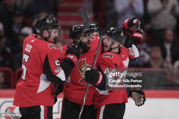 Johnny Oduya of Ottawa Senators celebrates after scoring to 3-3 during the 2017 SAP NHL Global Series match between Colorado Avalanche and Ottawa...