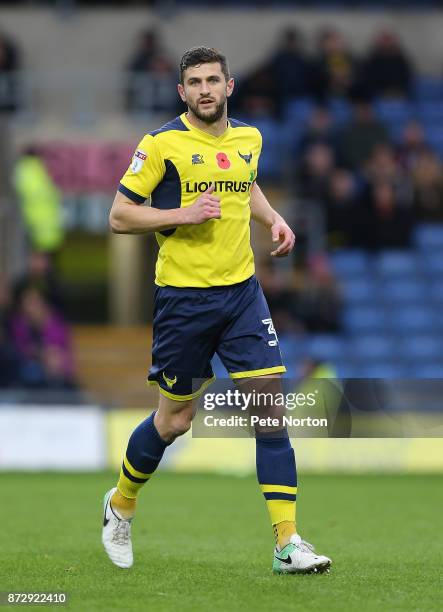 John Mousinho of Oxford United in action during the Sky Bet League One match between Oxford United and Northampton Town at Kassam Stadium on November...