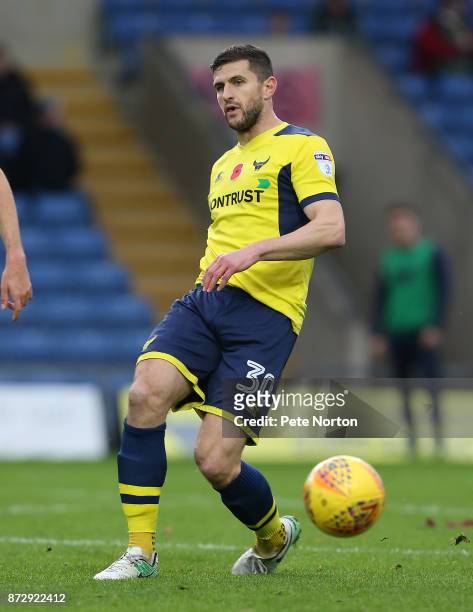 John Mousinho of Oxford United in action during the Sky Bet League One match between Oxford United and Northampton Town at Kassam Stadium on November...