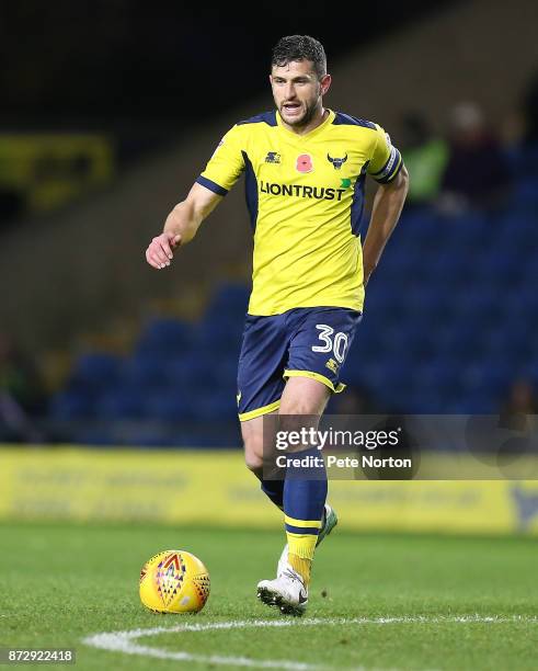 John Mousinho of Oxford United in action during the Sky Bet League One match between Oxford United and Northampton Town at Kassam Stadium on November...