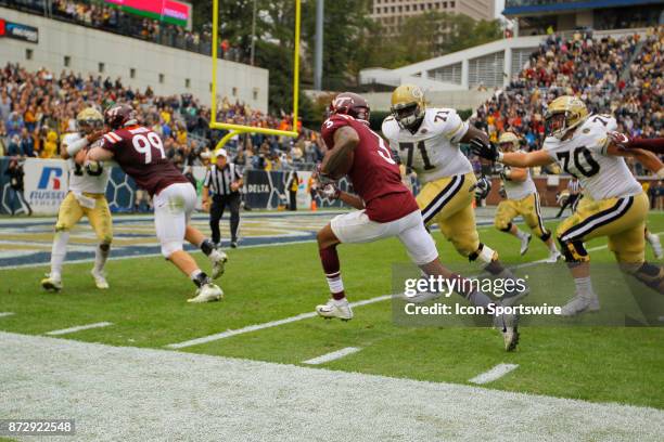 Virginia Tech Hokies cornerback Greg Stroman makes an interception and returns it for a touchdown during the Virginia Tech Hokies v Georgia Tech...