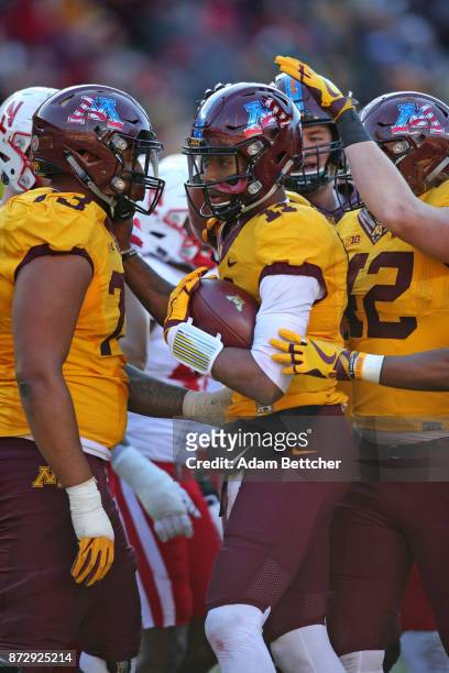 Demry Croft of the Minnesota Golden Gophers celebrates a touchdown in the fourth quarter against the Minnesota Golden Gophers at TCF Bank Stadium on...