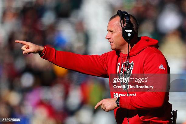 Head coach Dave Doeren of the North Carolina State Wolfpack gestures during the first half against the Boston College Eagles at Alumni Stadium on...