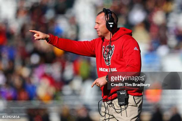 Head coach Dave Doeren of the North Carolina State Wolfpack gestures during the first half against the Boston College Eagles at Alumni Stadium on...
