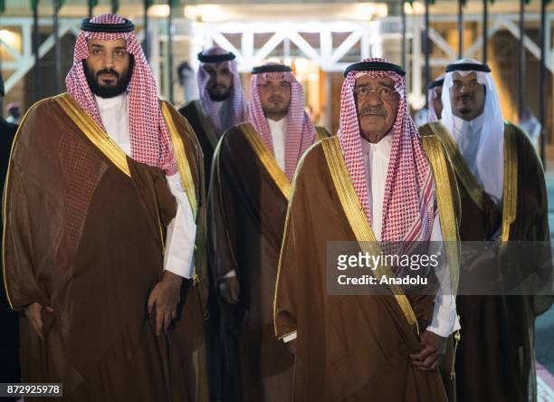 Saudi Crown Prince and Defense Minister of Saudi Arabia Mohammad bin Salman al-Saud and Saudi Prince Muqrin bin Abdulaziz wait to welcome King of...