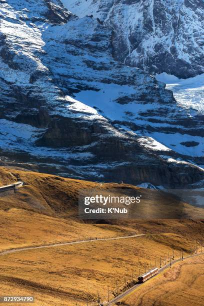 train railway on high alps mountain to jungfrau, top of europe, at kleine scheidegg, switzerland - k'nub stock pictures, royalty-free photos & images