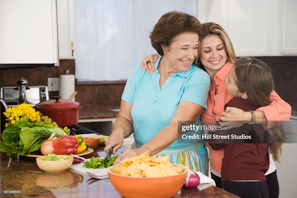 Hispanic Cook Hispanic Family Cooking In Kitchen High-Res Stock Photo - Getty Images