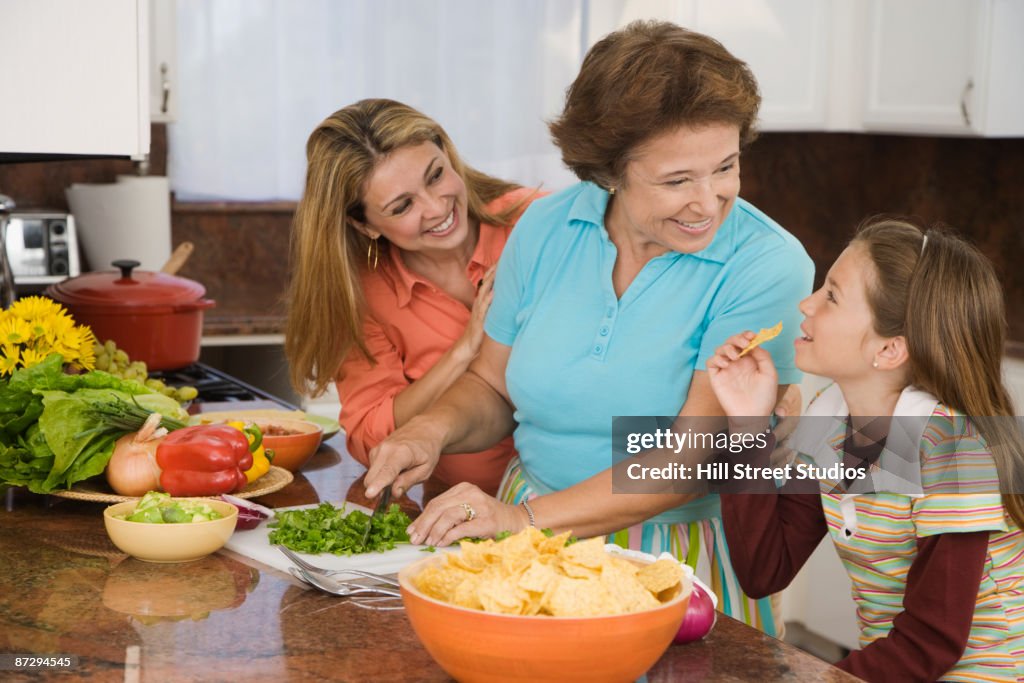 Hispanic Cook Hispanic Family Cooking In Kitchen High-Res Stock Photo - Getty Images