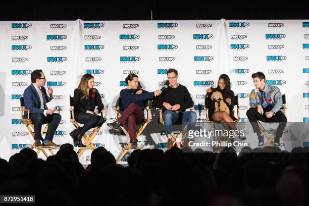 Moderator Thor Diakow talks with actors Danielle Panabaker, Carlos Valdes, Tom Cavanagh, Candice Patton and Grant Gustin during 'The Flash" Q&A at...