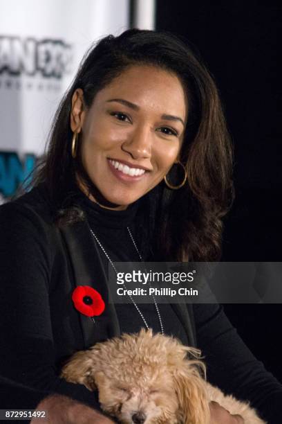Actress Candice Patton and her dog Zoe attend 'The Flash" Q&A at Fan Expo Vancouver in the Vancouver Convention Centre on November 11, 2017 in...
