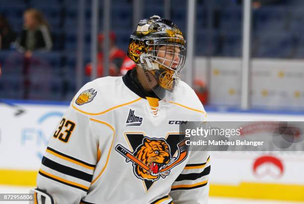 Tristan Cote-Cazenave of the Victoriaville Tigres skates prior to his game against the Quebec Remparts at the Centre Videotron on October 12, 2017 in...