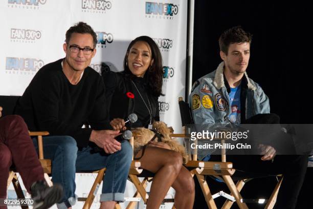 Actors Tom Cavanagh, Candice Patton and Grant Gustin attend 'The Flash" Q&A at Fan Expo Vancouver in the Vancouver Convention Centre on November 11,...