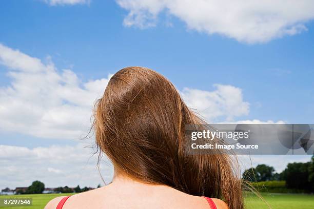 rear view of woman - back of womens heads stockfoto's en -beelden