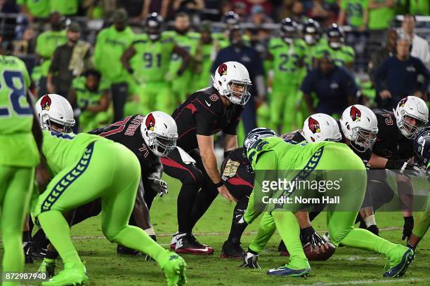 Drew Stanton of the Arizona Cardinals calls out signals while getting ready to take the snap from under center against the Seattle Seahawks at...
