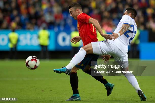 Spain's forward Iago Aspas vies with Costa Rica's defender Ronald Matarrita during the international friendly football match Spain against Costa Rica...