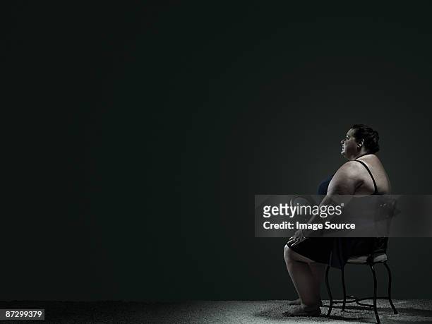 woman in chair with mirror - big fat white women stock pictures, royalty-free photos & images