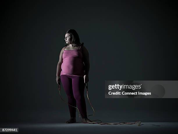 girl with skipping rope - big spotlights stock pictures, royalty-free photos & images