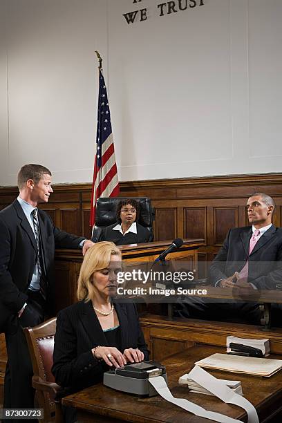 a lawyer questioning a suspect - court reporter stock pictures, royalty-free photos & images