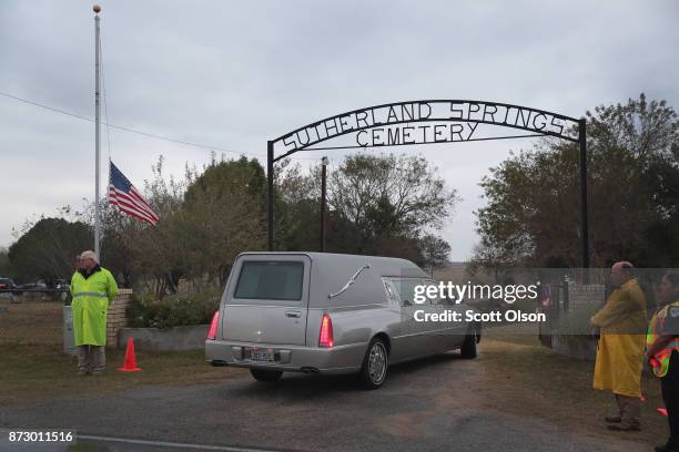 Hearses carrying the remains of Ricardo Rodriguez and his wife Therese arrive at the Sutherland Springs Cemetery on November 11, 2017 in Sutherland...