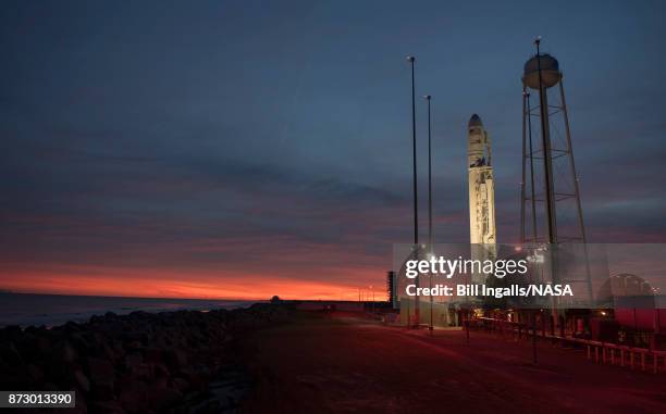 In this handout provided by the National Aeronautics and Space Administration , the Orbital ATK Antares rocket, with the Cygnus spacecraft onboard,...