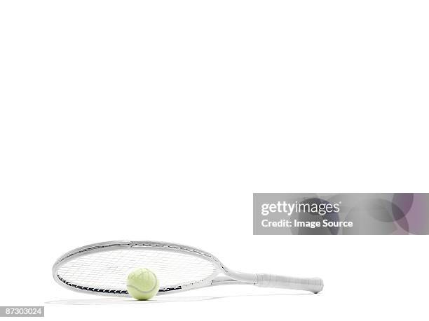 tennis racket and ball - tennis racquet isolated stock pictures, royalty-free photos & images